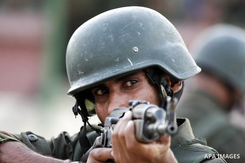 Members of the Palestinian security forces demonstrate their skills during a graduation ceremony in the West Bank city of Jericho, July 31, 2010. Photo by Eyad Jadallah
