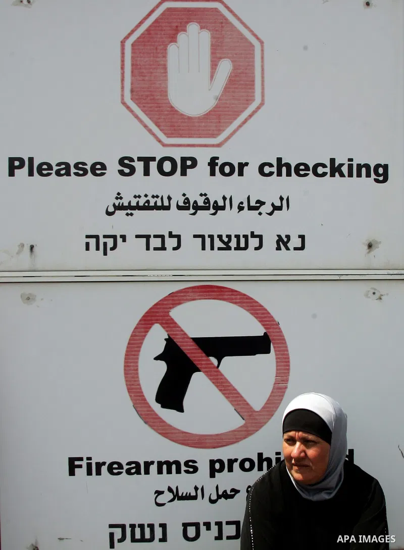 Palestinians whose houses have been occupied by Israeli settlers protest in front of UNWRA (United Nations Relief and Works Agency ) offices on August 2, 2010 to mark one year since the Palestinian families were evicted...
