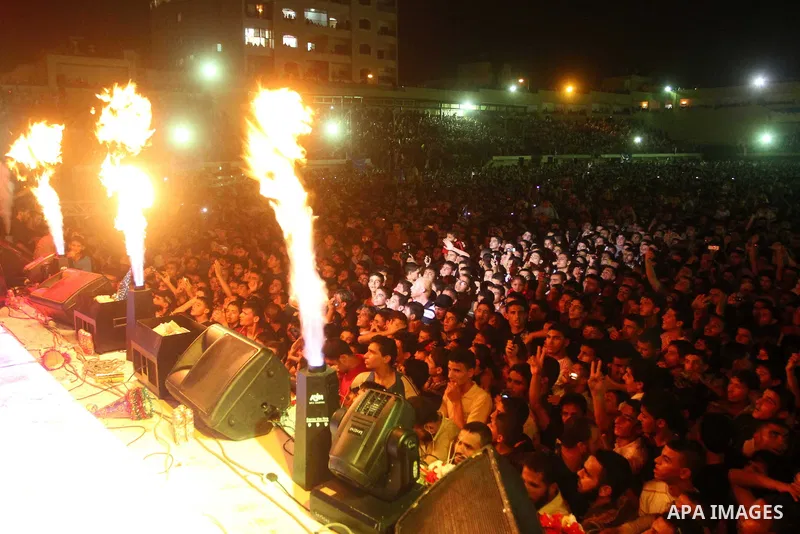 Palestinians attend a concert by Birds of Paradise group during an Islamic song festival in Gaza City on August 3, 2010. Photo by Ashraf Amra