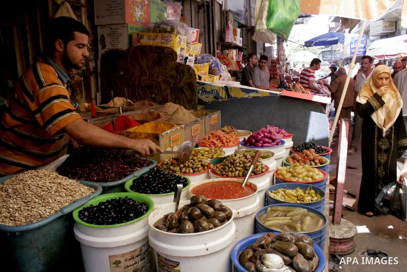 Palestinians shop at a traditional market in preparation for the holy month of Ramadan on August 5,2010. Islam's holy month of Ramadan will begin in 11 August in the Middle East depending on the sighting of the crescent...