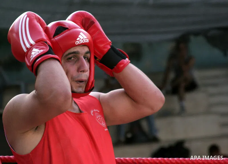 Palestinian players participate in a boxing match in the West Bank city of Hebron on August 6,2010. The players came from the different occupied West Bank cities. Photo by Mamoun Wazwaz