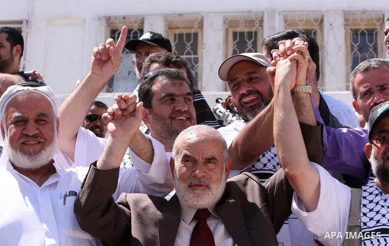 The spokesman of the Palestinian Parliament, Ahmed Bahr meets with the miles of smiles convoy members in Gaza city on August 10,2010. The miles of smiles convoy entered Gaza from Rafah crossing border on Monday during a...