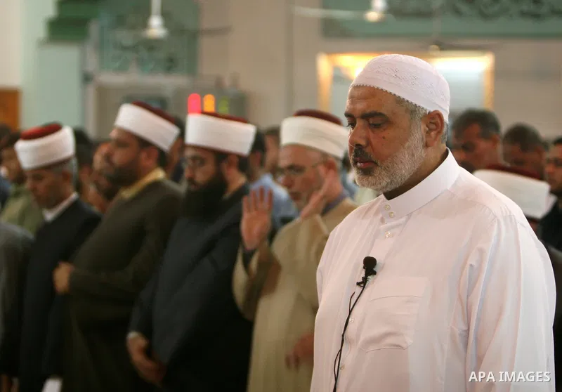 Palestinian Prime Minister in Gaza Strip, Ismail Haniyeh attends Altaraweh prayers in Gaza city on August 10,2010. Photo by Ali Jadallah