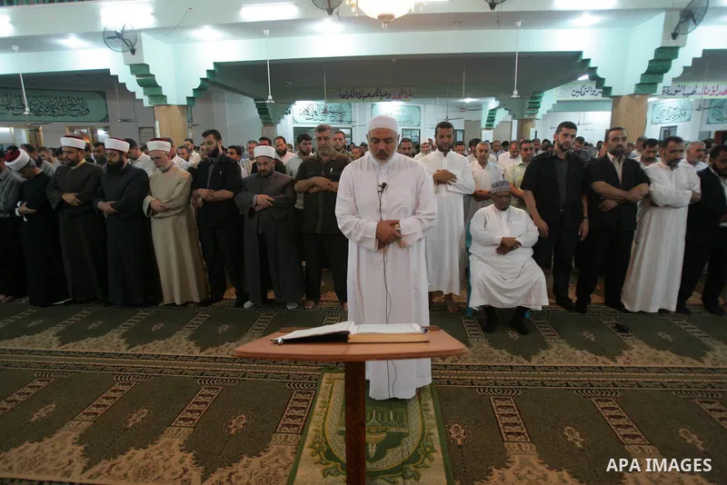 Palestinian Prime Minister in Gaza Strip, Ismail Haniyeh attends Altaraweh prayers in Gaza city on August 10,2010. Photo by Ali Jadallah