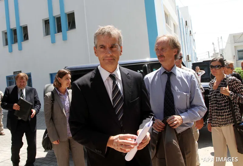 Norway's Foreign Minister Jonas Gahr Stoere walks before a news conference at the U.N. Relief and Works Agency (UNRWA) headquarters in Gaza City August 16, 2010. The Palestinian Authority's budget is in the red and donor...