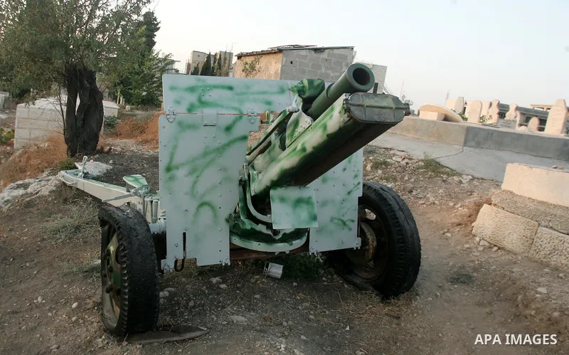 The traditional Ramadan cannon, which marks sunset and the end of the fasting day for observant Muslims, is fired from the Muslim cemetery on Salah Eddein street in Jerusalem on August 19, 2010. Photo by Mahfouz Abu Turk