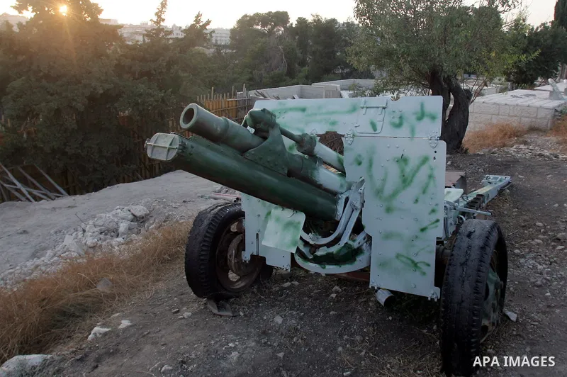 The traditional Ramadan cannon, which marks sunset and the end of the fasting day for observant Muslims, is fired from the Muslim cemetery on Salah Eddein street in Jerusalem on August 19, 2010. Photo by Mahfouz Abu Turk