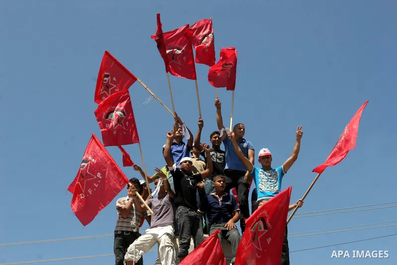 Palestinian supporters of Democratic Front for the Liberation of Palestine during a rally calling for reconciliation between Fatah and Hamas in Gaza City on August 28,2010 . Photo by Mohammed Asad