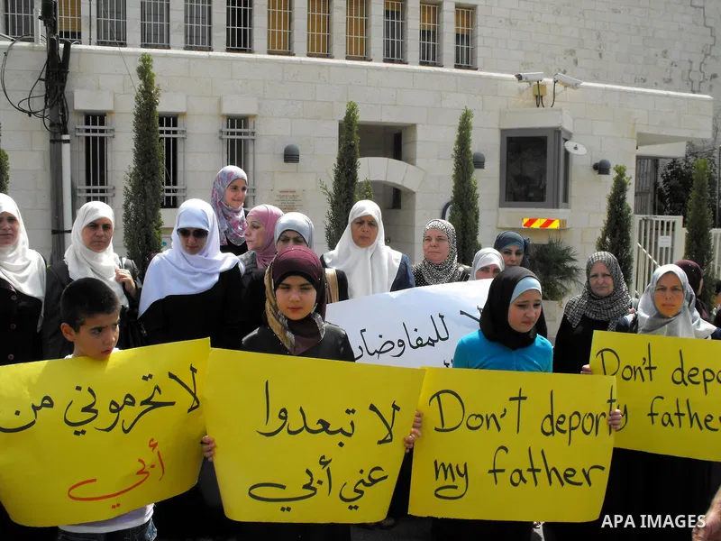 Palestinians protest at the Red Cross yard in East Jerusalem on Sept 2,2010, in solidarity with PLC members and former Palestinian minister Ahmad Atwon, Mohammad Totah and Khalid Abu Arfeh. After the Israeli authorities...