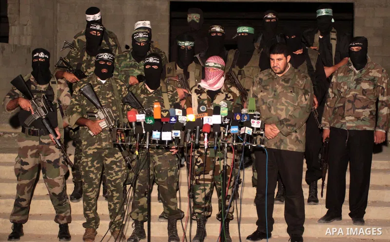 Hamas militants and other Palestinian militants group attend a press conference in Gaza City on Sept. 2, 2010. After a day and evening in White House talks with US President Barack Obama, Israeli Prime Minister Benjamin...