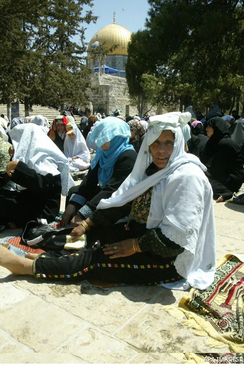 Muslims pray in front of the Dome of the Rock on the compound known to Muslims as al-Haram al-Sharif and to Jews as Temple Mount during the final Friday of the holy month of Ramadan in Jerusalem's Old City September 3, 2...