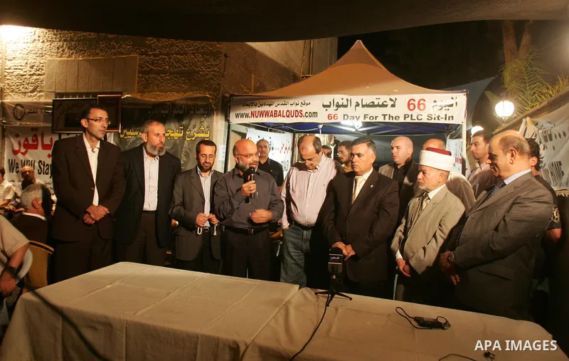 Palestinians activist take part in a weekly demonstration on September 4, 2010 in the mostly Arab neighborhood of Sheikh Jarrah in Jeruslaem where a protest is held against Israeli settlements and occupation . Photo by M...