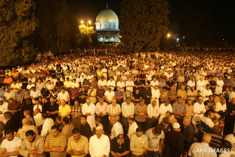 Muslims pray during Laylat al-Qadr in front of the Dome of the Rock on the compound known to Muslims as al-Haram al-Sharif and to Jews as Temple Mount, in Jerusalem's Old City during the Muslim holy month of Ramadan Sept...