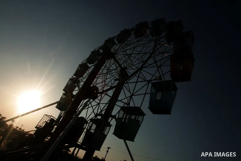Palestinians enjoy riding at amusement in the city of Asda'a in the southern Gaza Strip city of Khan Yunis, on September 23, 2010, as dozens of coffeeshops and tiny resturants have popped up along this stretch of Gaza's...