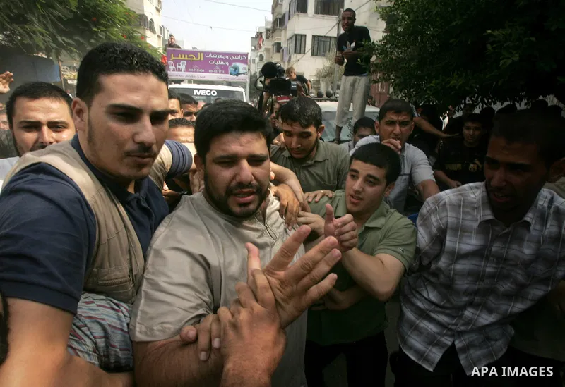 Mohammed Dababesh, a top Hamas security official, is greeted by relatives after his release in Gaza City on September 24, 2010. Egypt freed the top Hamas security official after holding him for 10 days on what Cairo medi...