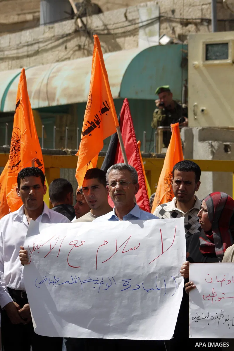 The Chief of the National Initiative Party, Mustafa Barghouti takes part in a demonstration in the old city of the West Bank city of Hebron on Sept. 27,2010 against the Israeli settlements. Israel let a moratorium on new...