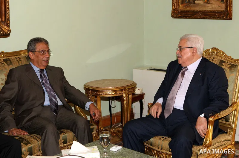 Palestinian President Mahmoud Abbas during a meeting with the Secretary General of the League of Arab States, Amr Moussa in Cairo on Oct. 4,2010. Photo by Thaer Ganaim