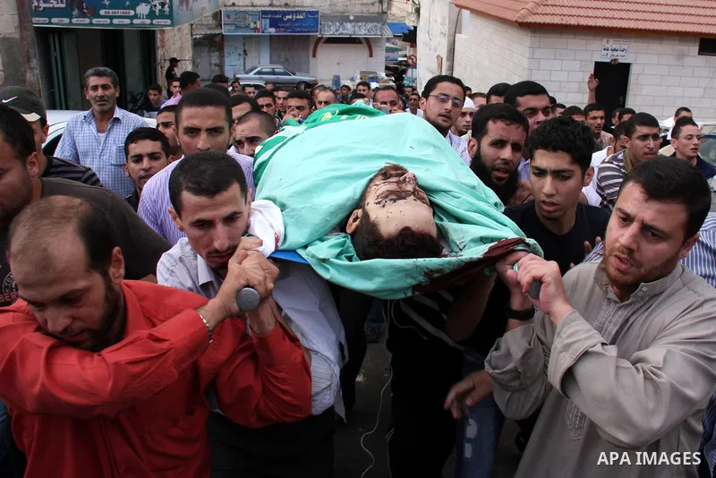 Palestinians carry the body of senior Hamas militant Nashat al-Karmi during his funeral, in the West Bank city of Tulkarem, Friday, Oct. 8, 2010. Israeli troops killed two senior Hamas militants in an early-morning raid...