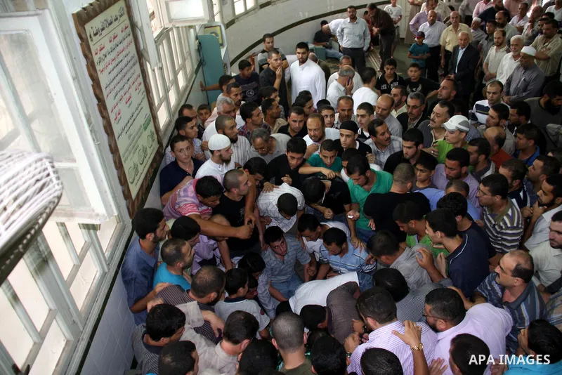 Palestinians carry the body of senior Hamas militant Nashat al-Karmi during his funeral, in the West Bank city of Tulkarem, Friday, Oct. 8, 2010. Israeli troops killed two senior Hamas militants in an early-morning raid...