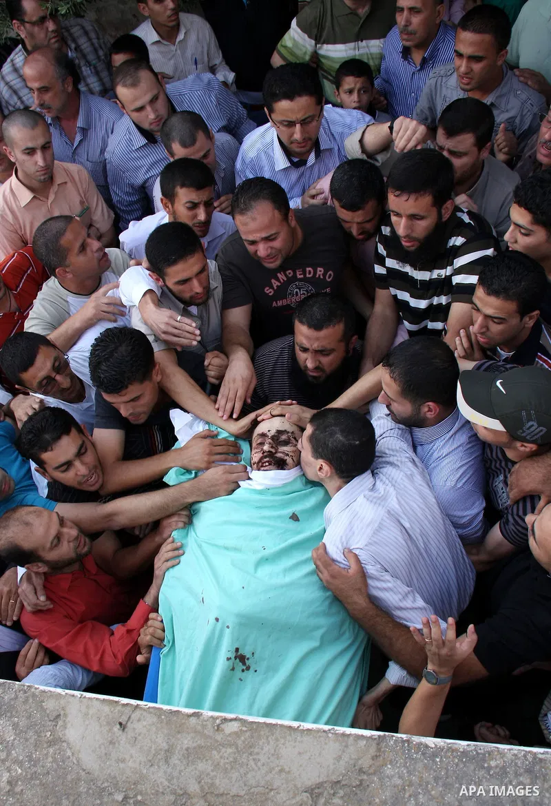 Palestinians carry the body of senior Hamas militant Nashat al-Karmi during his funeral, in the West Bank city of Tulkarem, Friday, Oct. 8, 2010. Israeli troops killed two senior Hamas militants in an early-morning raid...