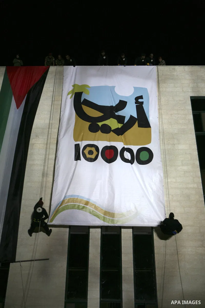 Palestinians put a poster wrote on it Areha "Jericho", in West Bank city of Jericho , on Oct. 11.2010 . Jericho is one of the oldest continuously inhabited cities in the world, with evidence of settlement dating back to...