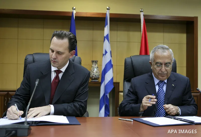Palestinian Prime Minister Salam Fayyad during the signing agreement ceremony with the foreign minister of Greece, Demetrios Drotsas in the West Bank city of Ramallah on Oct. 18,2010. Photo by Eyad Jadallah