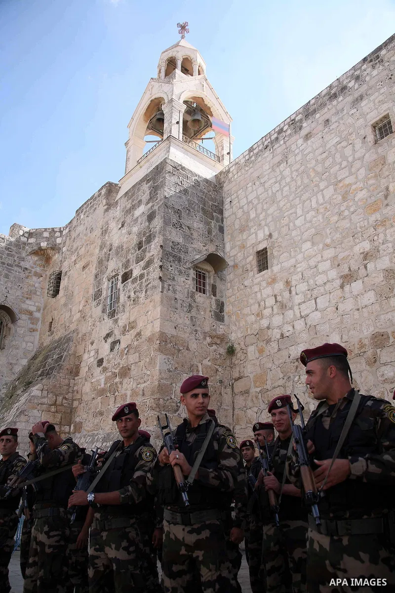 Palestinian security forces guard as Palestinian President Mahmud Abbas visit on 25 October 2010 the Church of the Nativity, believed by Christians to be the birth place of Jesus Christ, in the biblical West Bank town of...
