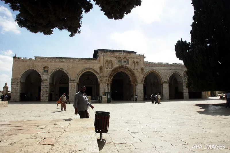 Palestinians walk in the Al Aqsa Mosque compound, also known to Jews as the Temple Mount, in Jerusalem's old city on Oct. 25, 2010. Photo by Mahfouz Abu Turk