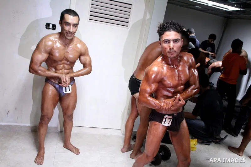 Palestinian athletes take part in a local bodybuilding competition in Gaza City on October 29, 2010. Photo by Ashraf Amra