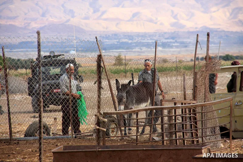 Israeli soldiers secure the area after clashes between Jewish settlers from Meswah settlement and Palestinians on the outskirts of Jiftlik, near Jericho in the West Bank town ,Sunday, Oct. 31, 2010. Frequently there are...