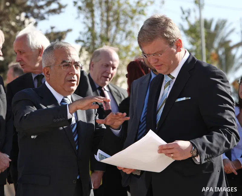Palestinian Prime Minister Salam Fayyad explaining to the EU Mission Commissioner Mr. ?tefan FÜLE, Cabinet of Enlargement and European Neighborhood Policy the obstacles preventing the development in what is classified as...
