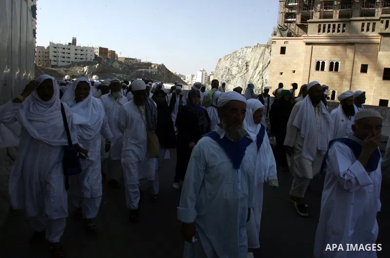 Muslim pilgrims walk outside the Grand Mosque during the annual Hajj in Mecca, Saudi Arabia, Nov 7, 2010. Some 2.5 million Muslims from more than 160 countries converge annually on the Islamic cities of Mecca and Medina...