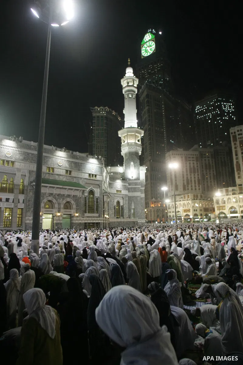 Muslim pilgrims walk outside the Grand Mosque during the annual Hajj in Mecca, Saudi Arabia, Nov 8, 2010. Some 2.5 million Muslims from more than 160 countries converge annually on the Islamic cities of Mecca and Medina...