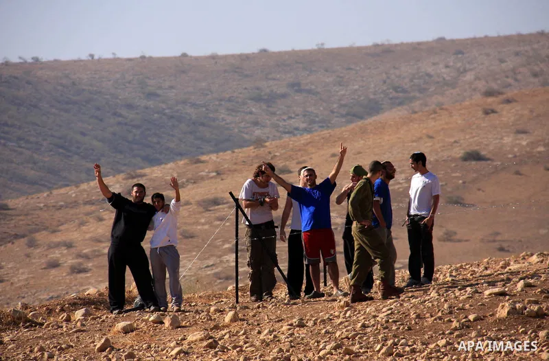 Israelis settlers seize a Palestinian land in the West Bank village of Tubas, near the Jordan Valley, on November 9, 2010 . Photo by Wagdi Eshtayah