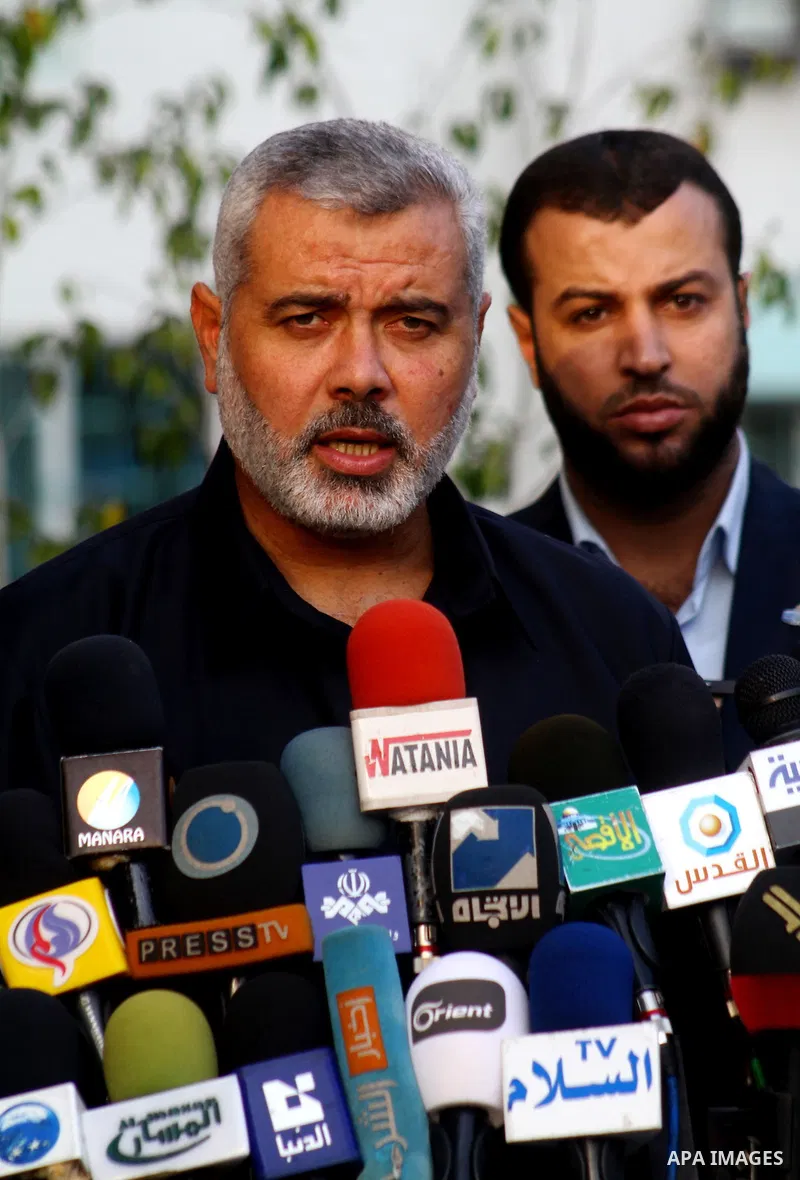 Palestinian Prime Minister in Gaza Strip, Ismail Haniyeh delivers speech during a press conference to announce the latest developments in the Palestinian reconciliation between Fatah and Hamas in Gaza City on Nov. 10, 20...