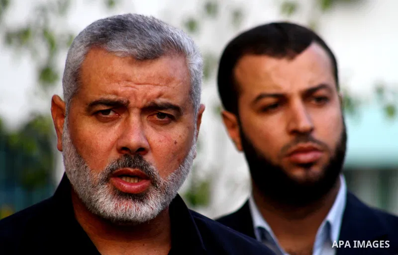 Palestinian Prime Minister in Gaza Strip, Ismail Haniyeh delivers speech during a press conference to announce the latest developments in the Palestinian reconciliation between Fatah and Hamas in Gaza City on Nov. 10, 20...