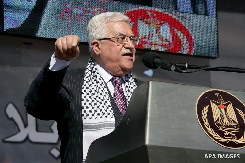 Palestinian President Mahmoud Abbas attends the sixth anniversary of the death of the Late Palestinian leader Yasser Arafat, on 11 November 2010, next to Arafat's grave in the West bank town of Ramallah. Arafat, who spea...