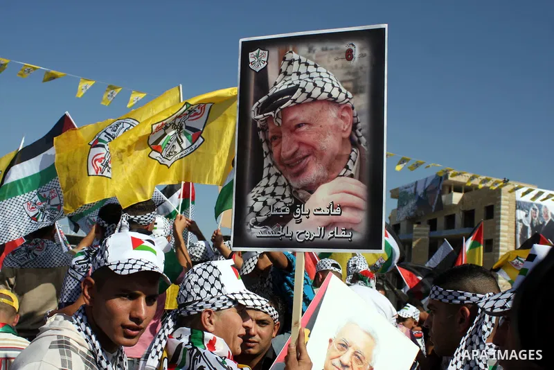 Thousands attend the sixth anniversary of the death of the Late Palestinian leader Yasser Arafat, on 11 November 2010, next to Arafat's grave in the West bank town of Ramallah. Arafat, who spearheaded the Palestinian cau...