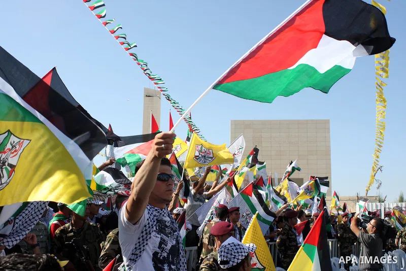 Thousands attend the sixth anniversary of the death of the Late Palestinian leader Yasser Arafat, on 11 November 2010, next to Arafat's grave in the West bank town of Ramallah. Arafat, who spearheaded the Palestinian cau...