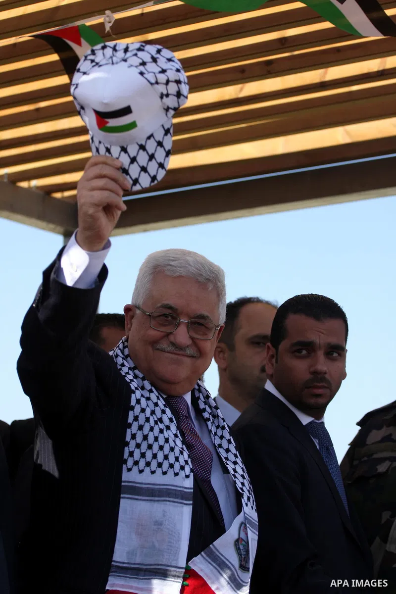 Palestinian President Mahmoud Abbas attends the sixth anniversary of the death of the Late Palestinian leader Yasser Arafat, on 11 November 2010, next to Arafat's grave in the West bank town of Ramallah. Arafat, who spea...