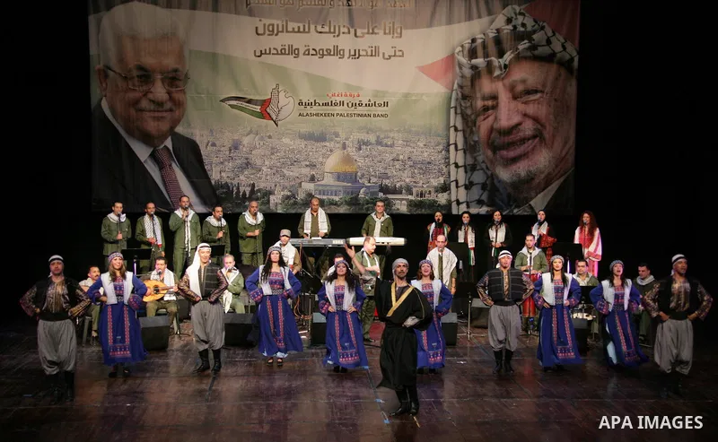 Palestinian President Mahmoud Abbas attends a celebration held by the lovers team in Ramallah Cultural Palace, to mark the sixth anniversary of late Palestinian leader Yasser Arafat death in the West Bank city of Ramalla...