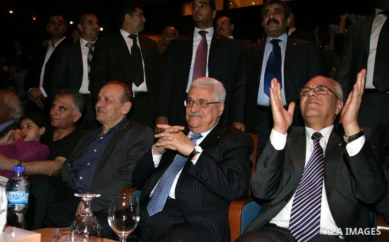 Palestinian President Mahmoud Abbas attends a celebration held by the lovers team in Ramallah Cultural Palace, to mark the sixth anniversary of late Palestinian leader Yasser Arafat death in the West Bank city of Ramalla...