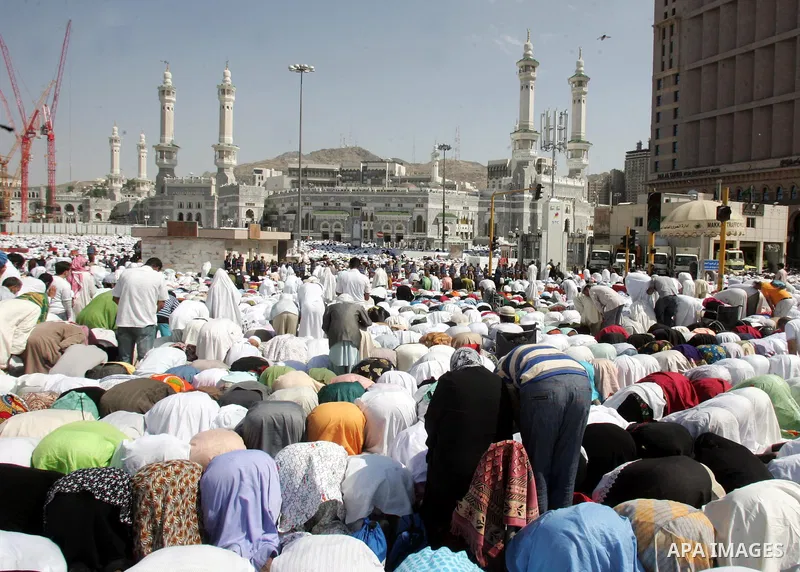 Muslim pilgrims attend Friday prayers outside the Grand Mosque during the annual Hajj in Mecca, Saudi Arabia, Nov 12, 2010. Some 2.5 million Muslims from more than 160 countries converge annually on the Islamic cities of...