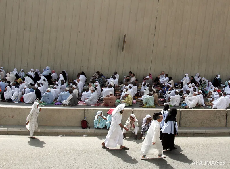 Muslim pilgrims attend Friday prayers outside the Grand Mosque during the annual Hajj in Mecca, Saudi Arabia, Nov 12, 2010. Some 2.5 million Muslims from more than 160 countries converge annually on the Islamic cities of...