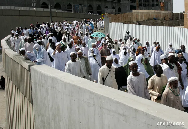 Muslim pilgrims attend Friday prayers outside the Grand Mosque during the annual Hajj in Mecca, Saudi Arabia, Nov 12, 2010. Some 2.5 million Muslims from more than 160 countries converge annually on the Islamic cities of...