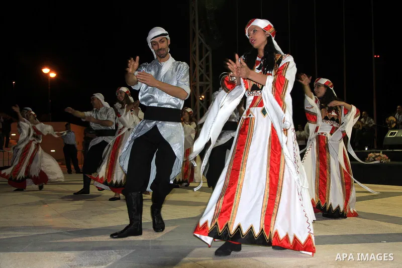 Palestinian musical band perform a traditional song during a concert commemorating the sixth anniversary of late Palestinian leader Yasser Arafat's death, in the West Bank city of Nablus, on Nov. 14, 2010. Photo by Wagdi...