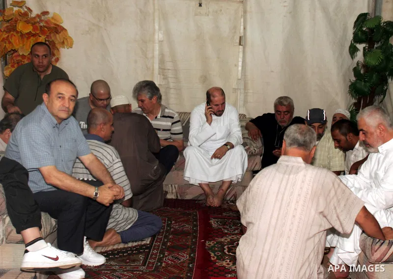 Palestinian Minister of Awqaf, Mahmoud al-Habash sits in his tent in Mina near the holy city of Mecca on November 17, 2010, as more than two million Muslim pilgrims launched into the final rituals of the hajj ahead of th...