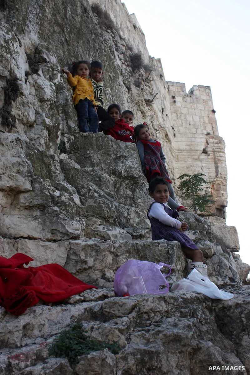 Palestinians celebrate in Jerusalem's old city on the second day of Eid al-Adha,on November, 17, 2010. as Muslims worldwide commemorate Eid al-Adha, or the Feast of the Sacrifice, marking the end of the hajj and commemor...