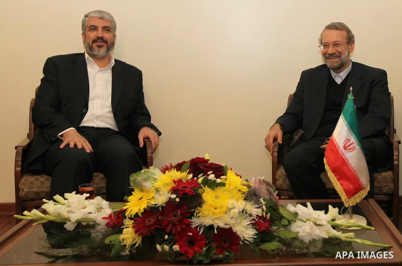 Palestinian Hamas leader Khaled Meshaal meets with Ali Larijani at the Iranian embassy headquarters , in Damascus on November 29,2010. Photo by STR