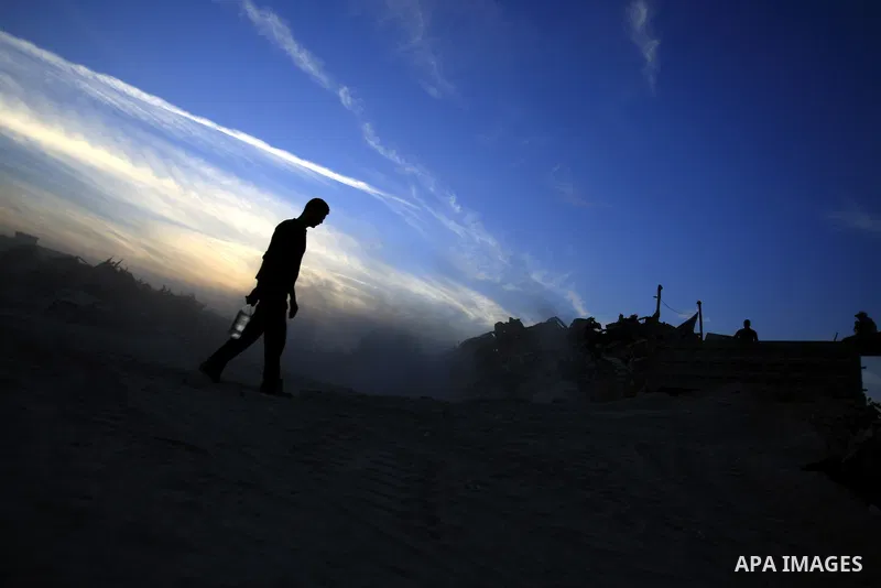 Palestinians work recycling rubble from the remains of ruined Palestinian buildings that were destroyed during the Israeli war against Hamas in the Gaza Strip, near the border between Israel and Gaza strip in the east of...